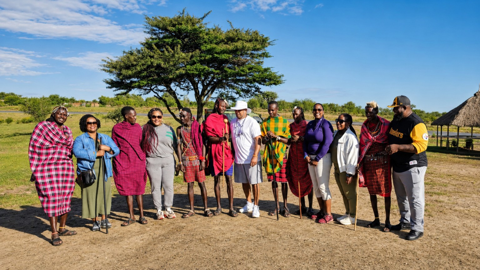 Leslie and fellow travelers sharing a cultural experience with a local community in Kenya