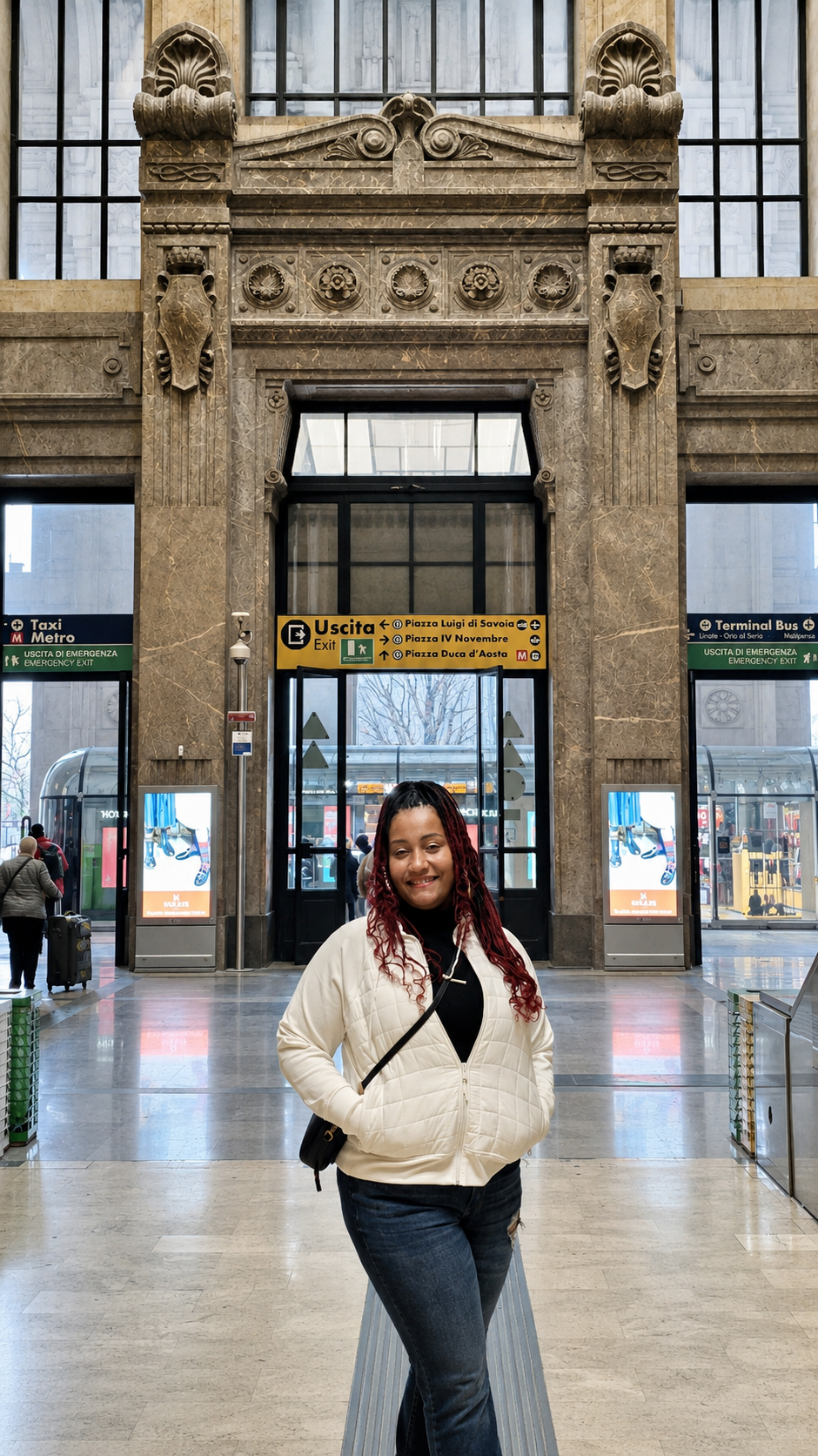 Leslie beneath the grand arches of Milano Centrale station