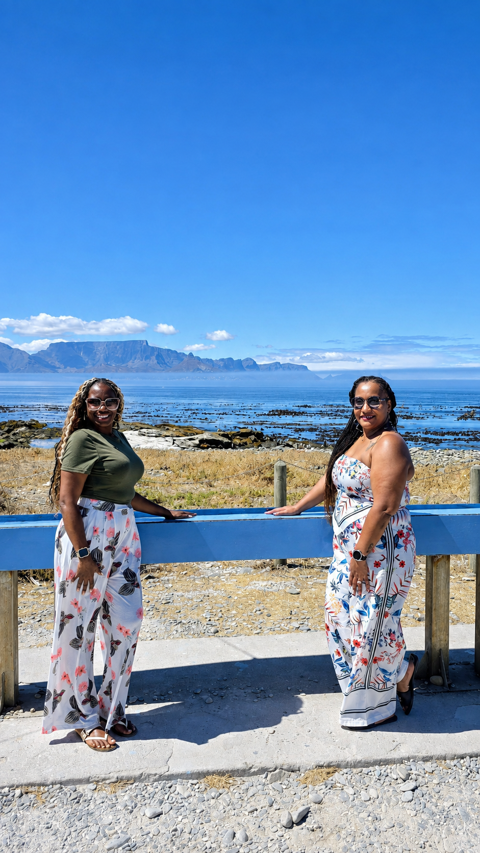 Friends overlooking Table Mountain and the Cape Town coastline
